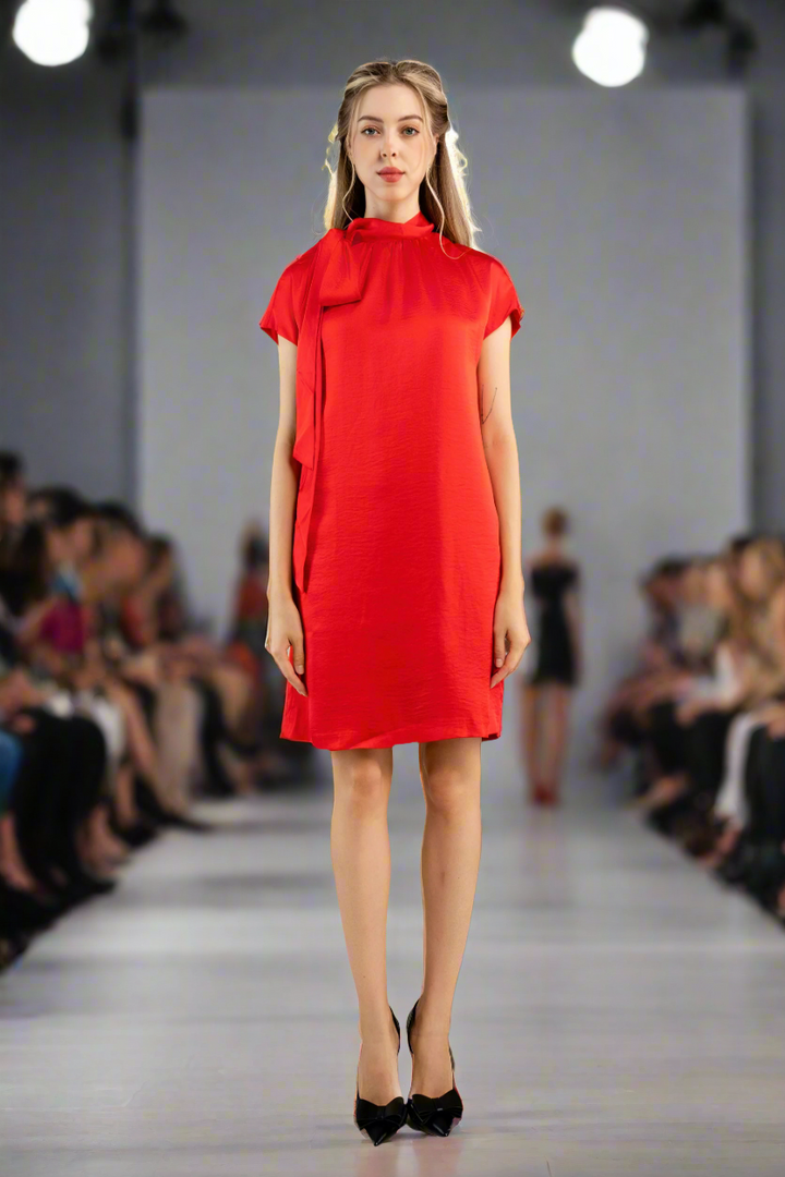 Red satin shift dress with bow on shoulder